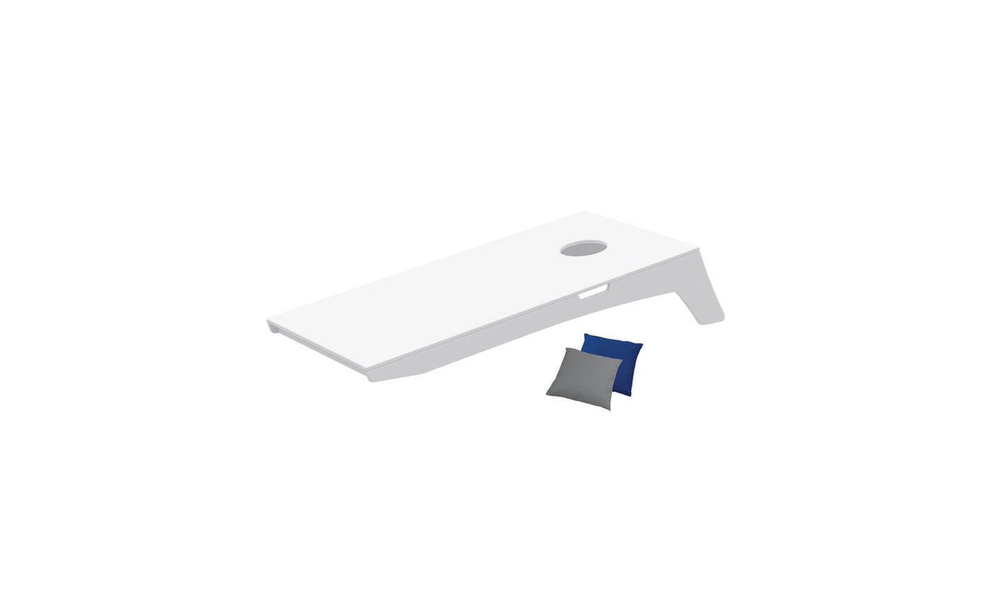 White cornhole toss board with gray and blue beanbags.