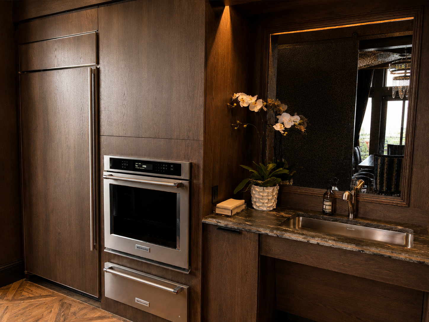 Modern kitchen with stainless steel oven and wooden cabinets