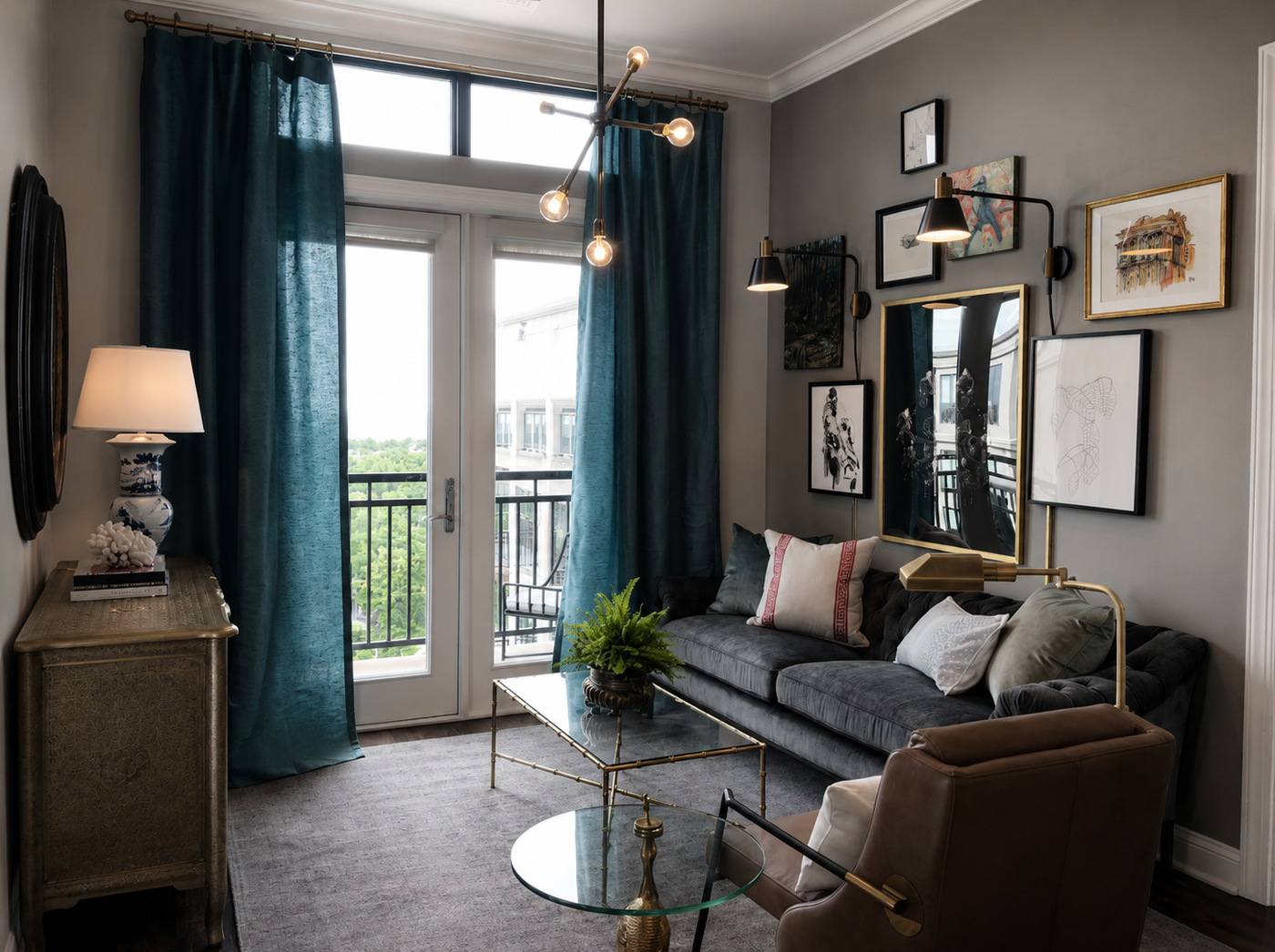 Modern living room with gray sofa, armchair, and decorative elements.