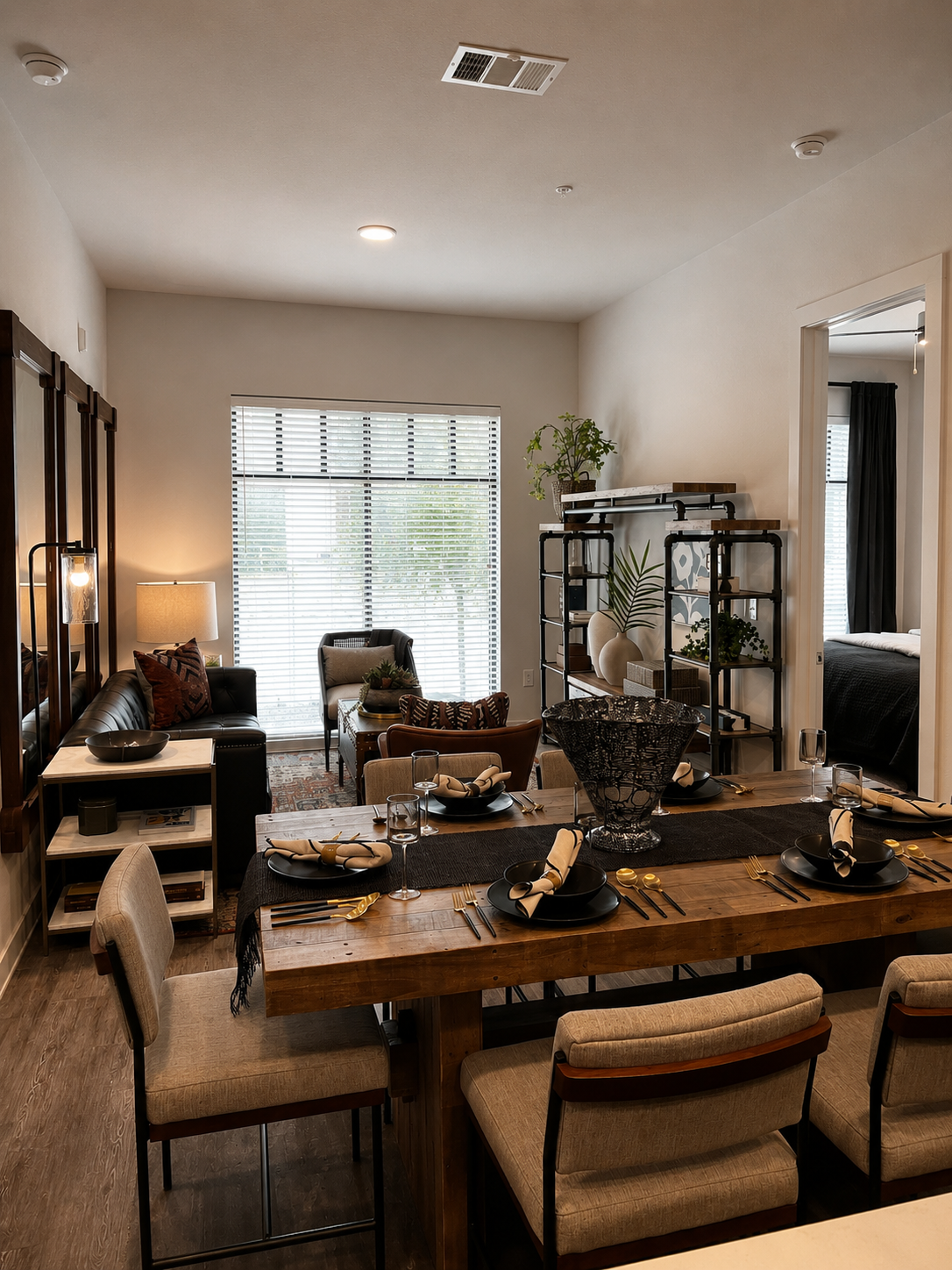 Modern living room with a dining table set, chairs, and decor.